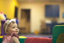 infant in a church nursery 