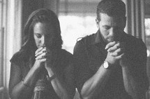 husband and wife in prayer