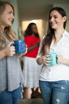 women in conversation drinking coffee at a women's group Bible study