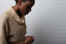 African-American woman in prayer 
