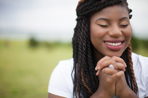 joyful woman in prayer 