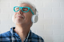man listening to headphones 