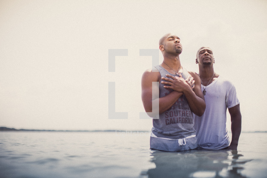 Baptism in the ocean water.