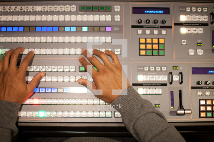 hands on a soundboard 