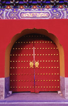 ornate red temple door 