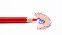 pen colored pencil and blue pencil shavings 