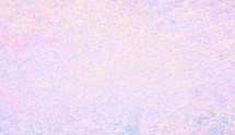 rough pastel textured surface backdrop in pink, blue, yellow, purple