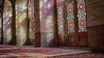 colors from stained glass windows stained into an old mosque 