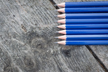 pencils on a desk 