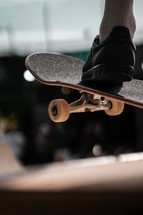 Skateboard on a skate ramp, extreme sports summer photo