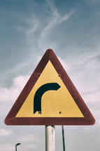 curve in the road sign 