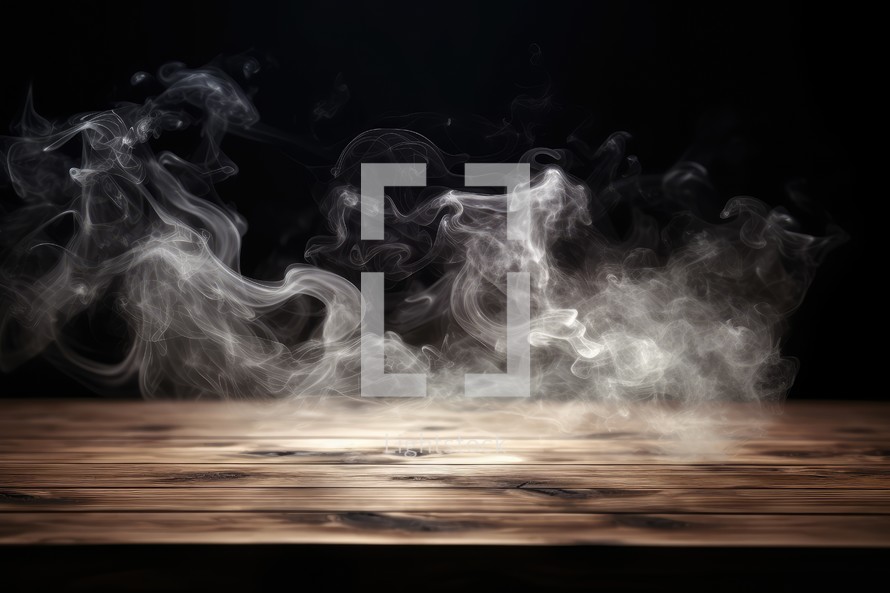 Smoke on a wooden table. Black background. Selective focus.