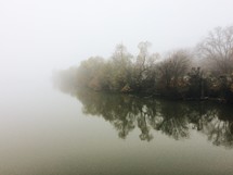 fog over a lake in fall 