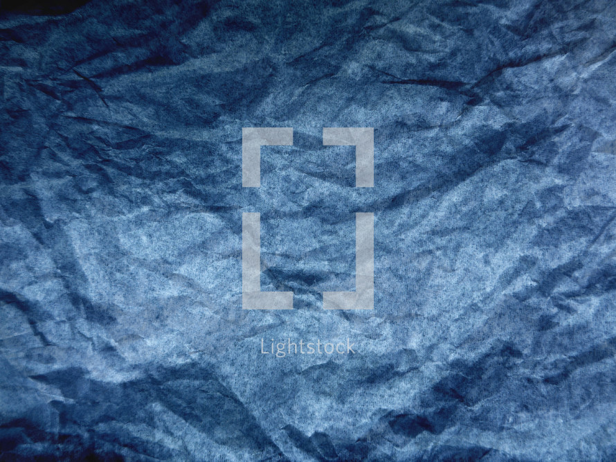 crumpled blue paper texture background