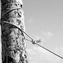 a rope around a post 