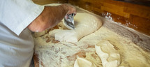man working with dough 