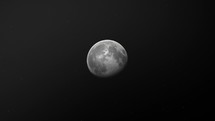 Waning Gibbous Moon In Dark Night Sky. zoom-out	
