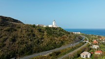 Lighthouse Of Calabria Hill Near The Coast