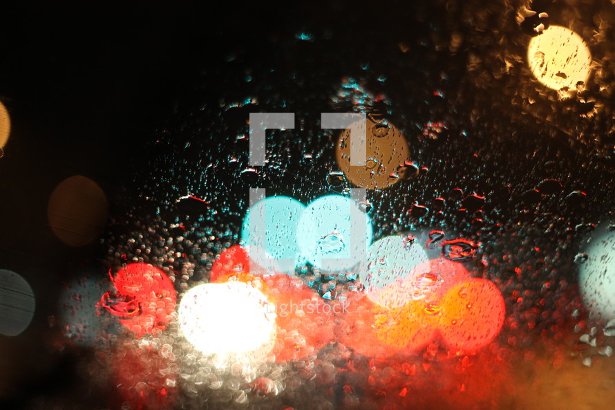 bokeh colorful lights and wet window 