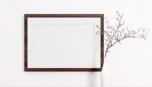Product placement concept. Mockup or copy space for media presentation. Wooden landscape frame on white background