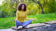 African American Woman Meditating, Feeling Peace In Megalopolis. Zen, Freedom
