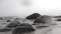 Sea waves washing rocks