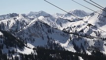 ski lift going up a mountain 