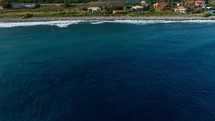 Beach And Water Near The Coast Of Ocean