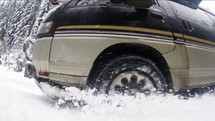 van driving through the snow 