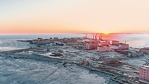 aerial view of anadyr town in russia during winter 4k drone shot