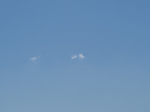 blue sky with wispy clouds useful as a background