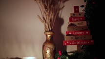 Assembled Christmas Decoration. Wooden DIY Christmas Tree On The Table With Candlelit Background. static