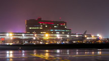 Timelapse of illuminated airport terminal