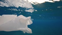 Plastic objects float in the sea