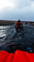 Guiding A Four Wheeler In Icelandic River Water 