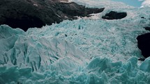 Calving Glaciers At Perito Moreno Glacier In Lake Argentino, Patagonia, Argentina. Tilt-up Shot