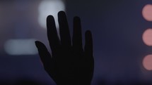 worshiping hand silhouette 