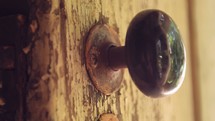 doorknob and keyhole on an old door 