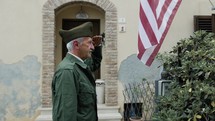 American General Second World War Salutes In Front Of His Base's House