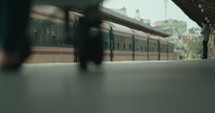 Footsteps of people walking quickly in the train station
