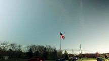 flag waving on a flagpole 