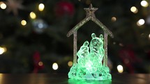 Glass nativity decoration with light that changes color