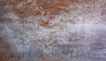 Large porcelain stoneware tiles for coverings. Stone and rust color background.