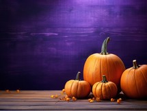 Halloween pumpkins on wooden table with copy space for your text