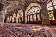 mosque carpers in colors from the windows