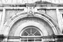 arched window on a building in old London 