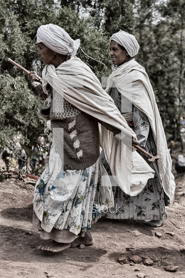 women walking to a celebration in Ethiopia 