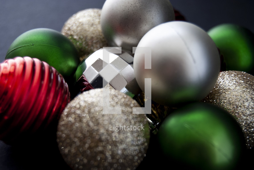 red, silver, and green Christmas ball ornaments 
