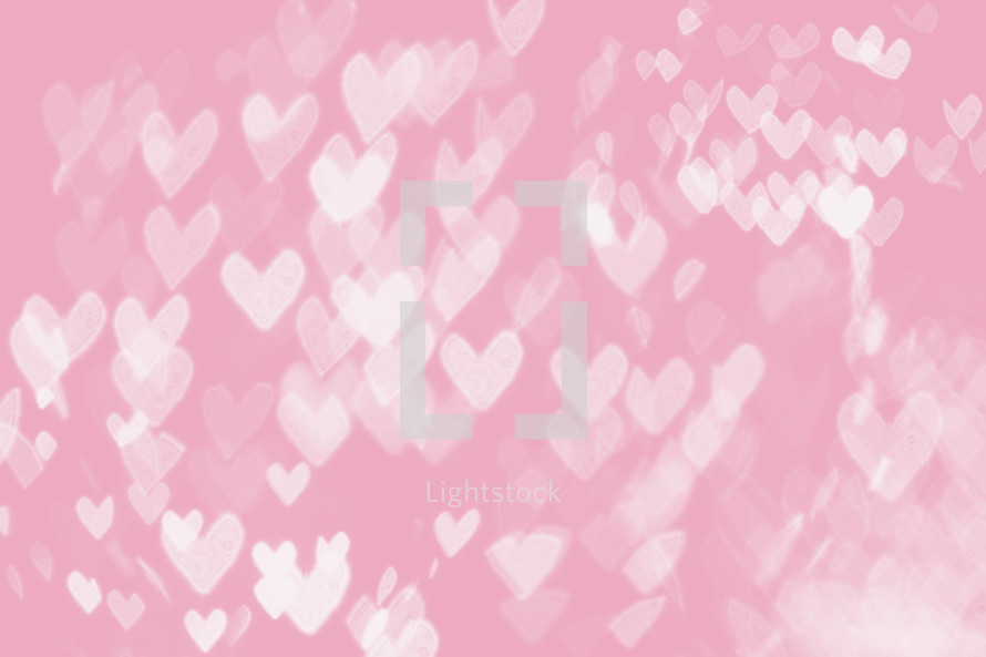 tints of pink heart shaped bokeh lights 