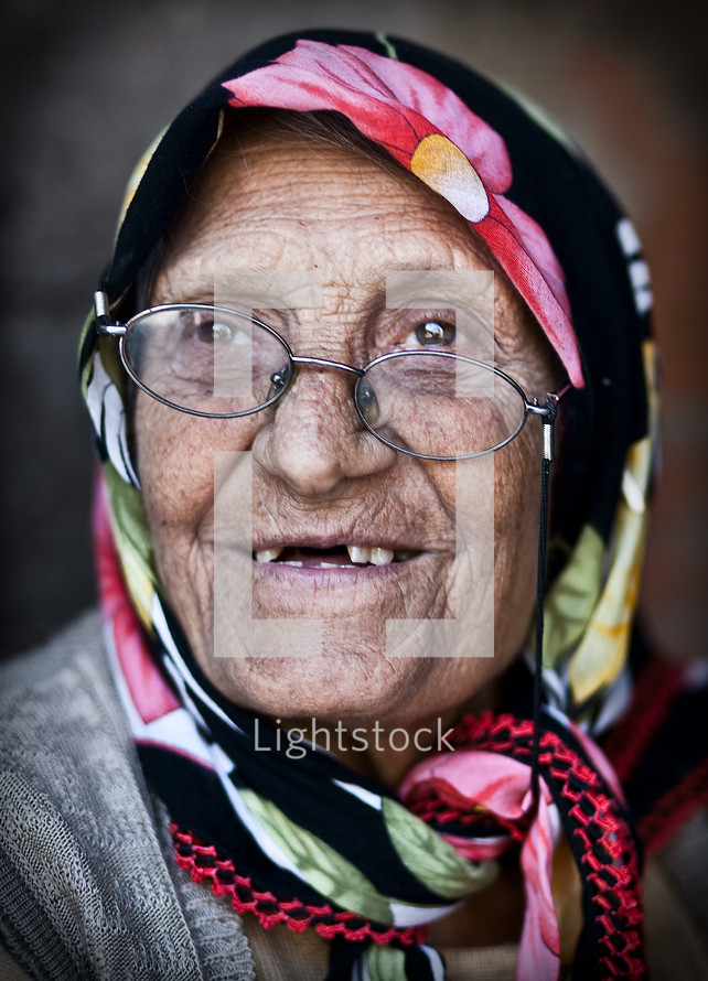 Elderly muslim woman missing teeth